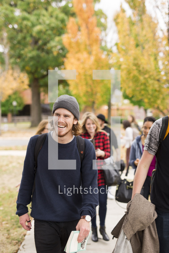 college students walking to class on campus