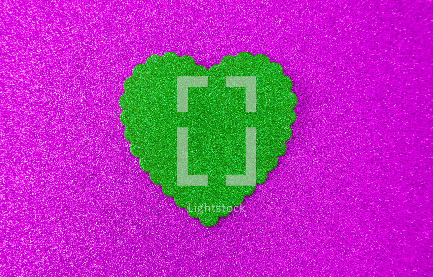 green heart on pink 