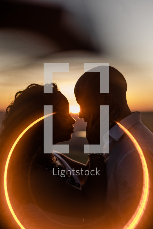 couple portrait in a halo of light 