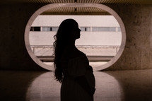 a silhouette of a pregnant woman 