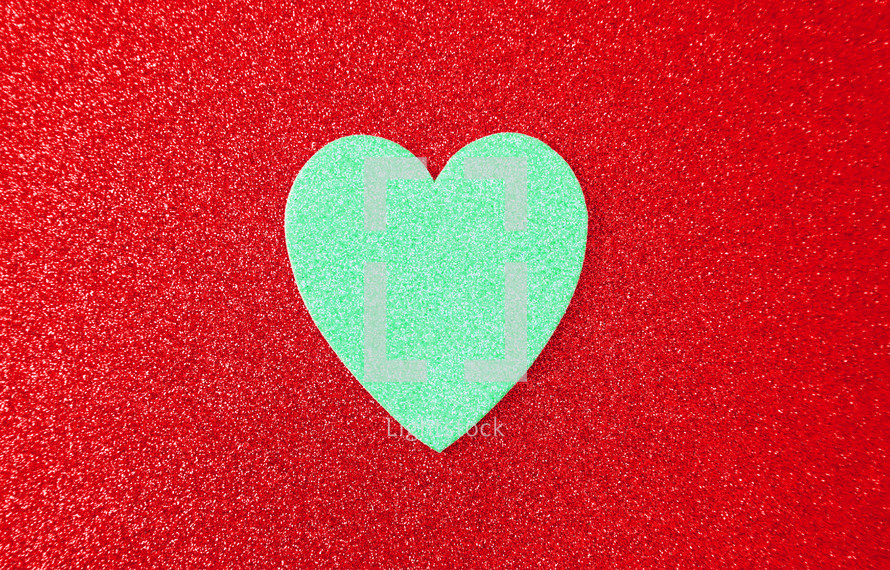 teal heart on red 