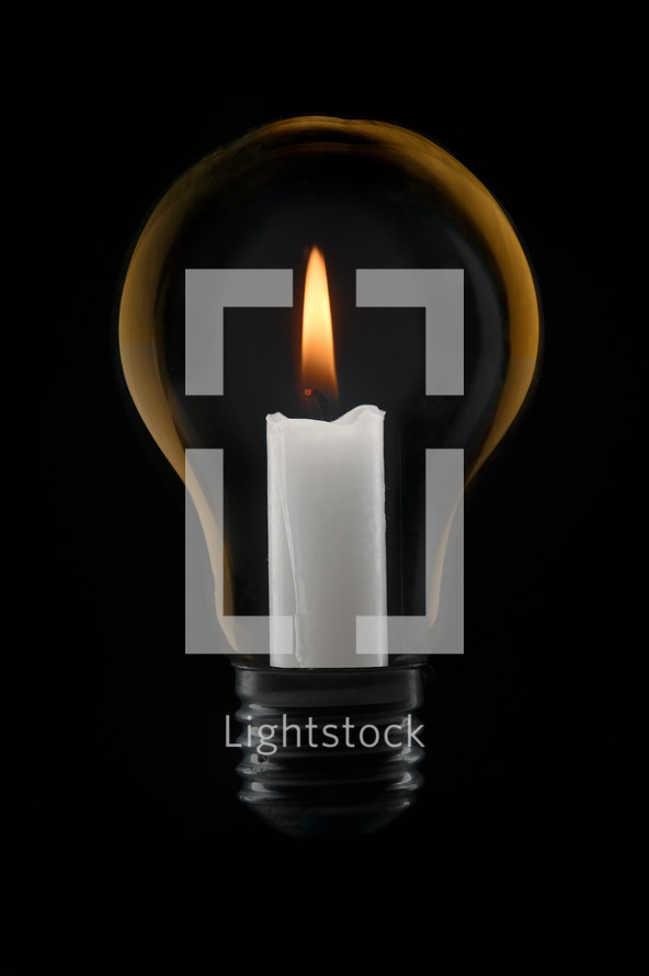 Abstract The Global Electricity Crisis Solution. Candle In A Light Bulb