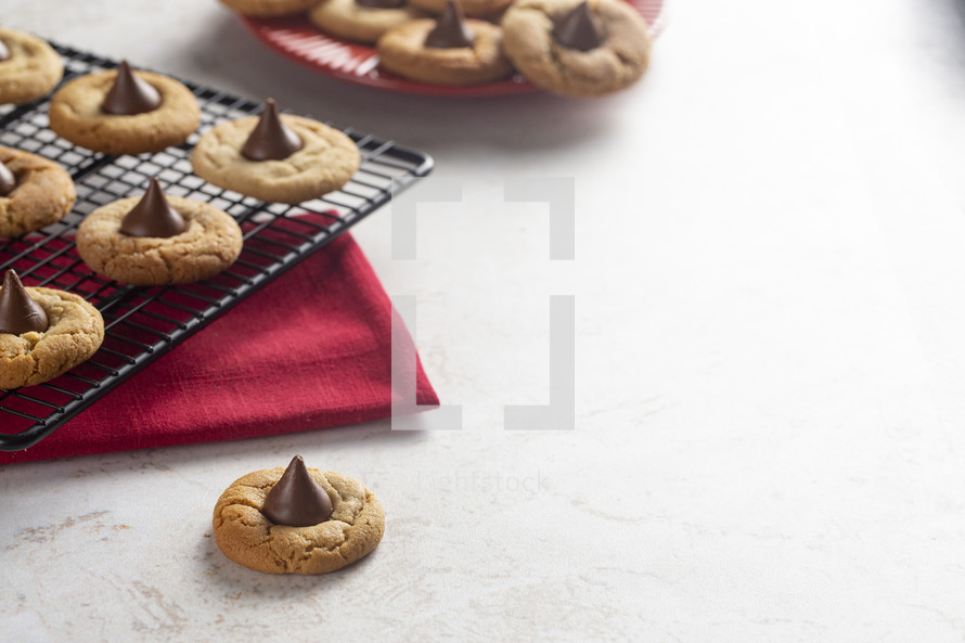 Classic Peanut Butter Blossom Cookies on a Kitchen Counter