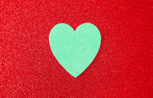teal heart on red 