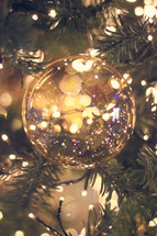 Christmas ornament and Christmas lights on a Christmas tree 