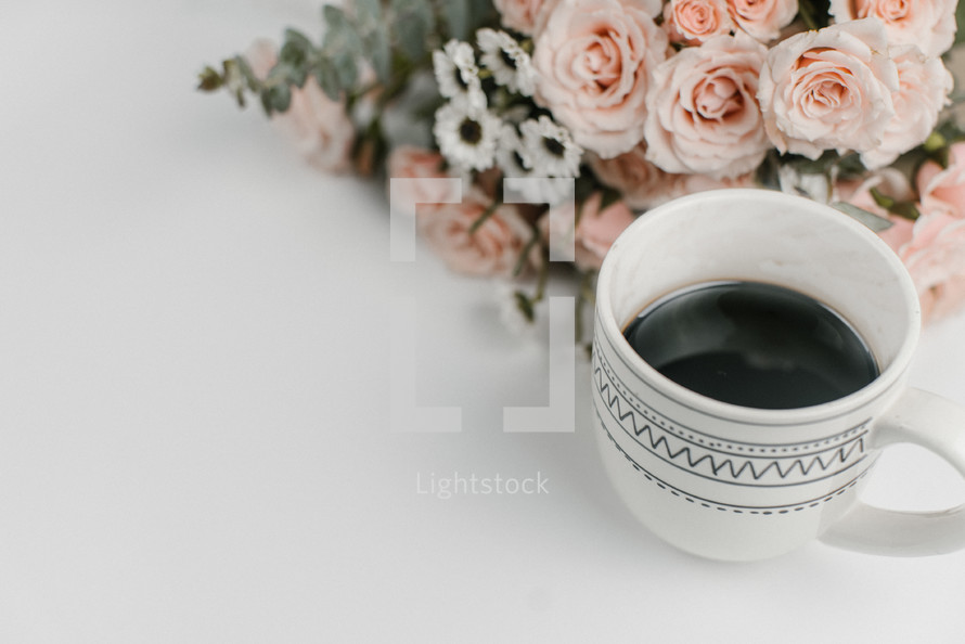 coffee mug and flowers 