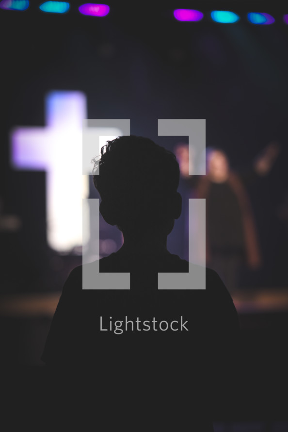silhouette of a boy child at church 