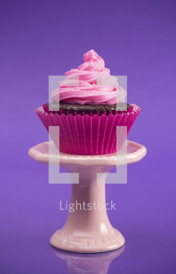 chocolate cupcake with pink icing 