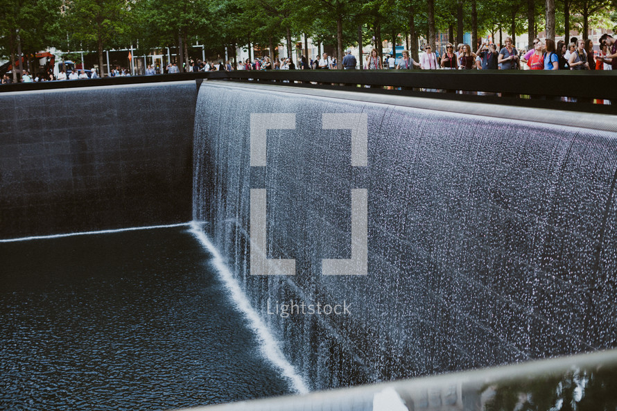 people visiting the 9/11 memorial 