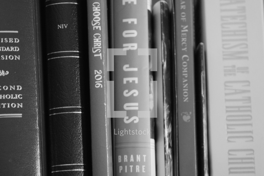 row of Christian books on a bookshelf 
