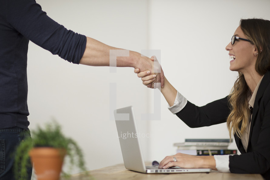 a handshake in the office 