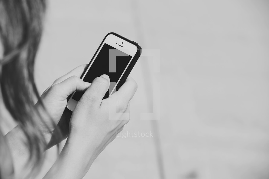 a woman checking her cellphone 