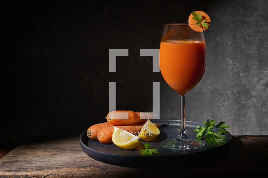 Freshly Made Carrot Juice with Lemon and Parsley