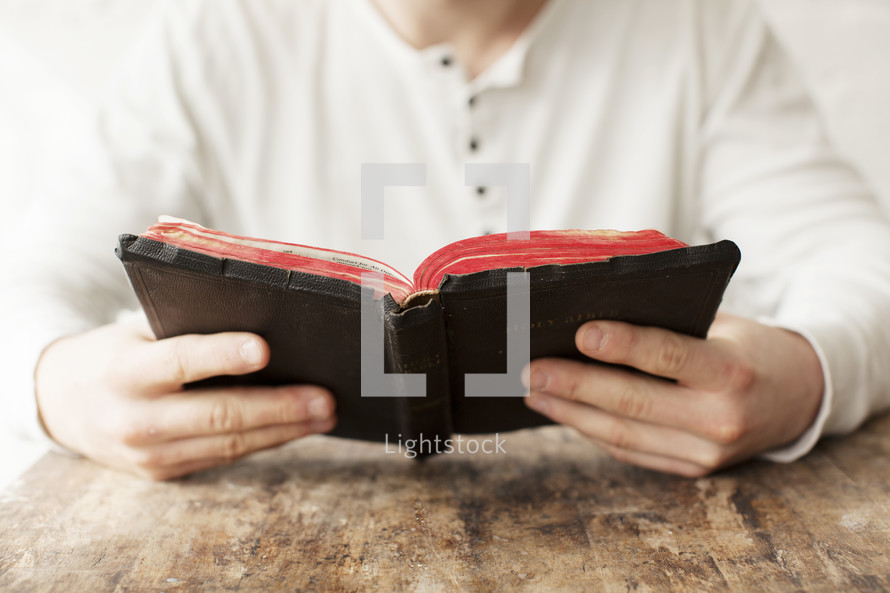 Reading the Bible.