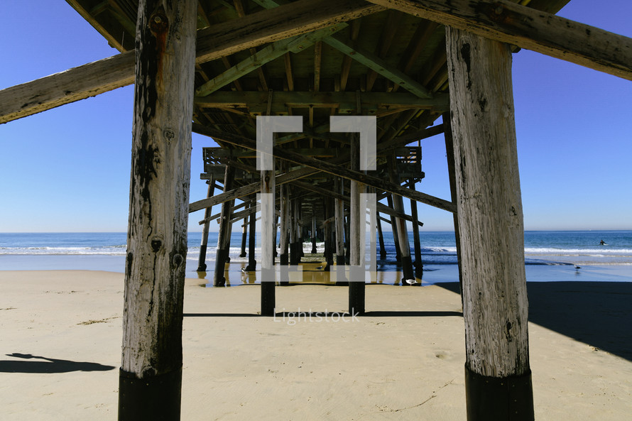 sand under a pier 