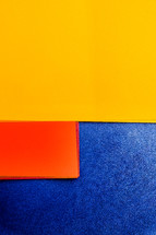 yellow, red, blue paper 