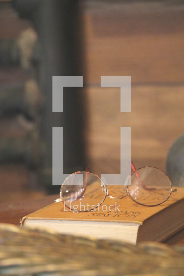 reading glasses on a book 