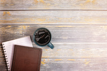 mug, Bible, and journal on a wood background 