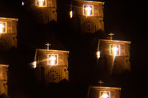 Church tower with glowing cross pattern 