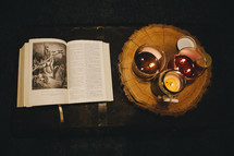 Scripture reading by candlelight.