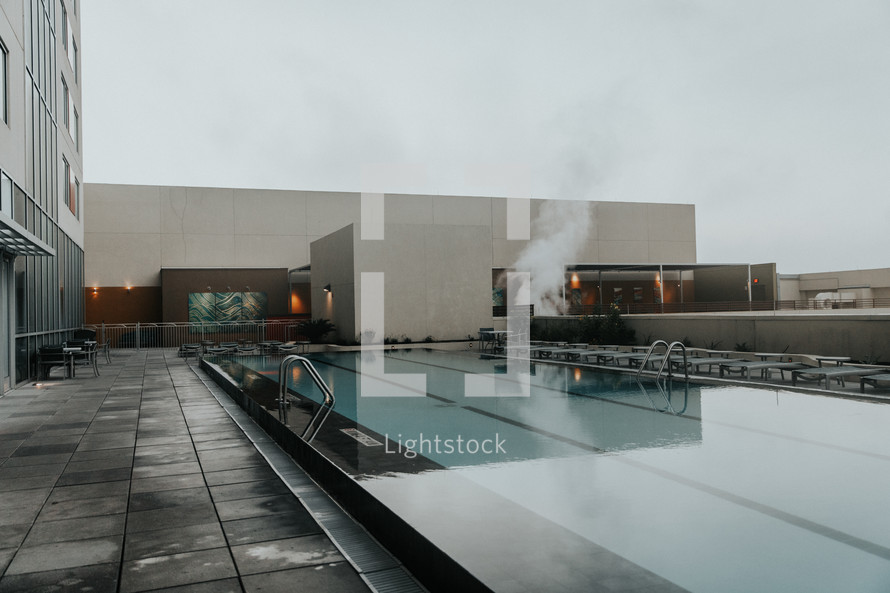 rooftop pool on a rainy day 