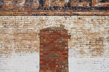 bricked in window on an old warehouse 