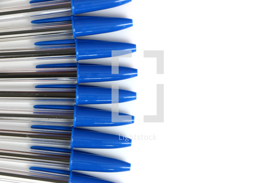 row of pens with blue ink 