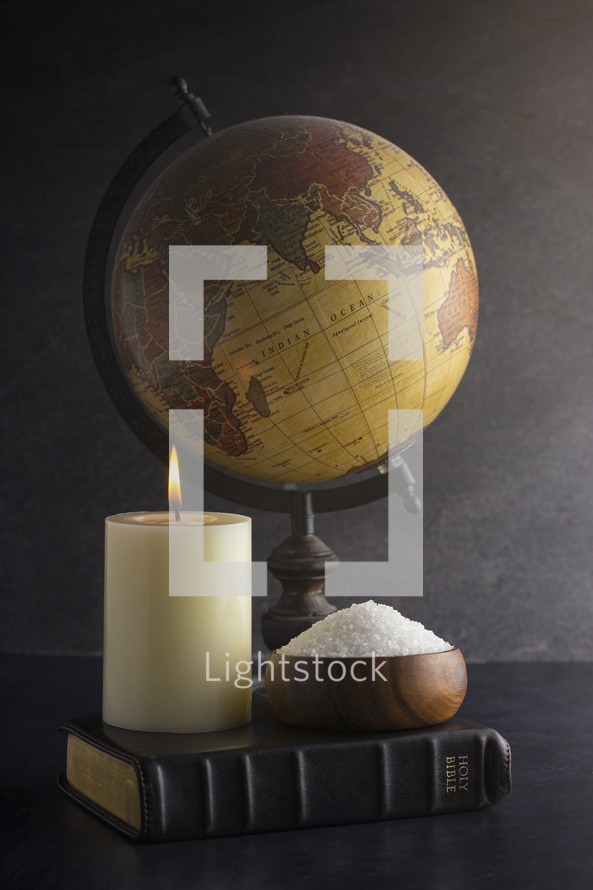Globe, Bible, candle and salt 