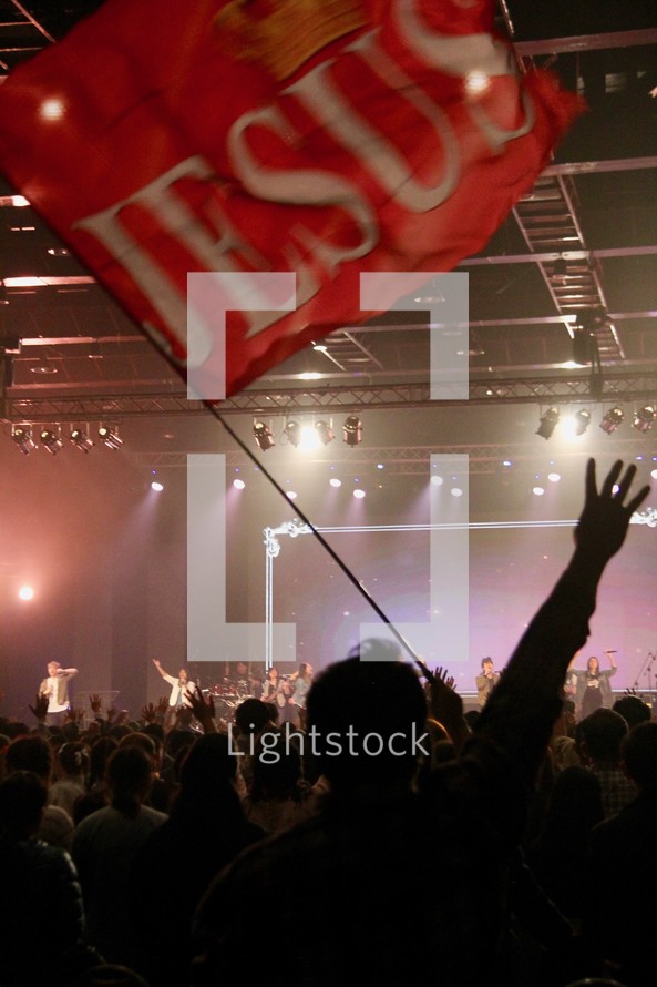 Jesus flag in the audience at a concert 