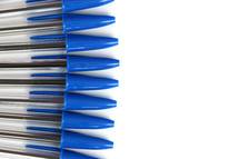 row of pens with blue ink 