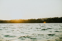 ripples on lake water at sunset 