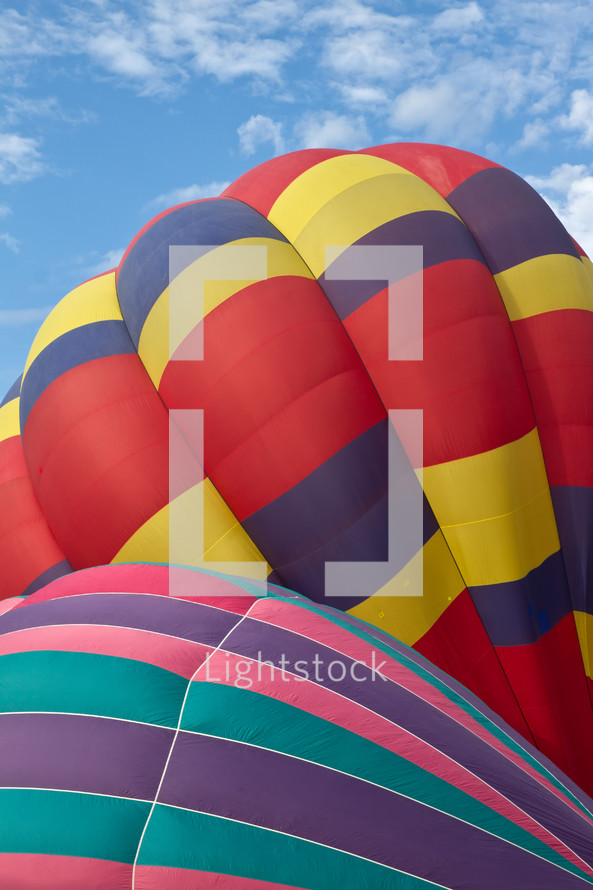 Close up shot of two colorful hot air balloons