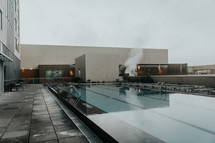 rooftop pool on a rainy day 