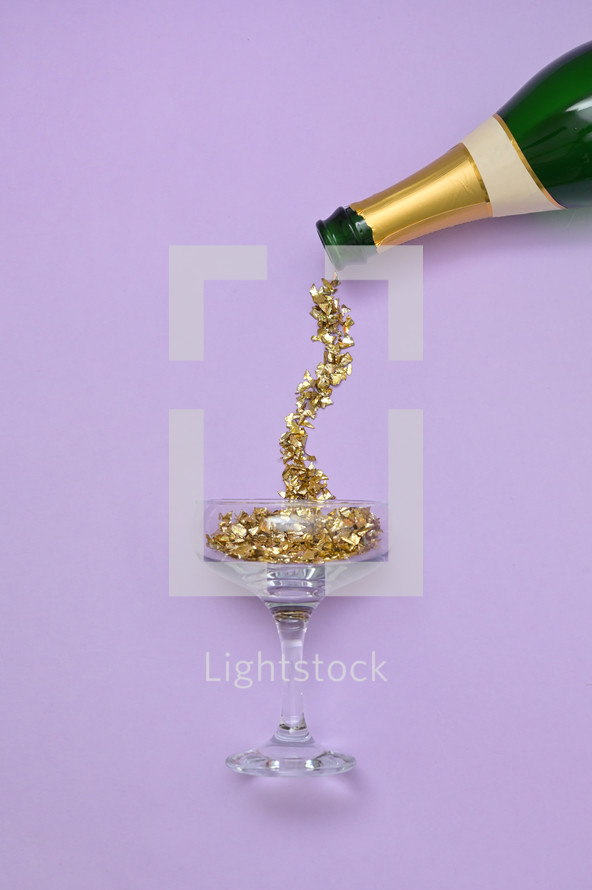 Confetti that looks like champagne being poured into a glass