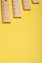 rulers on a yellow background 