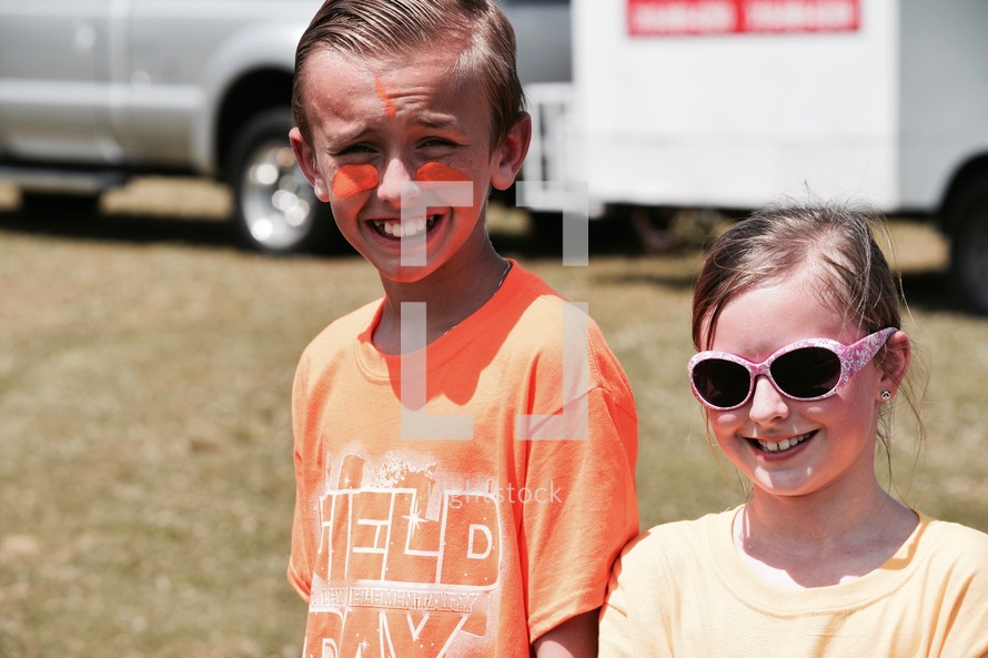 brother and sister outdoors at field day 