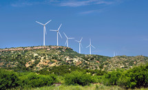 wind turbines on a hilltop 