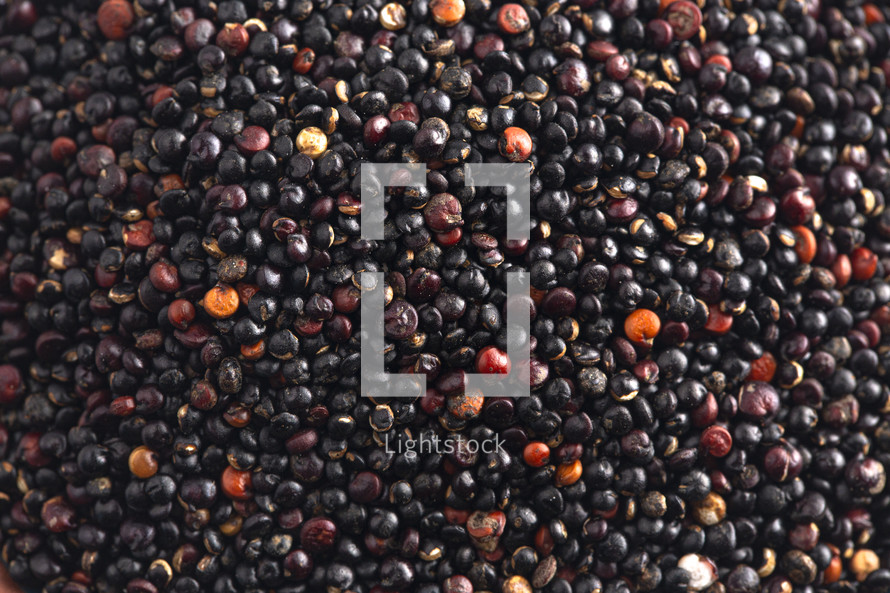 A Pile of Black Quinoa Background