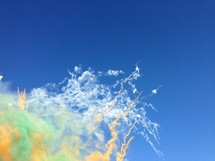 eruption and smoke in a blue sky 