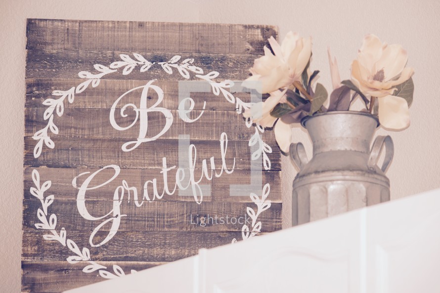 Be Grateful sign and magnolia flowers in a galvanized milk jug 