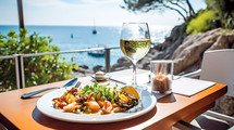 Fish-based restaurant with a delicious dish and a glass of wine near the sea in summer. AI Generated