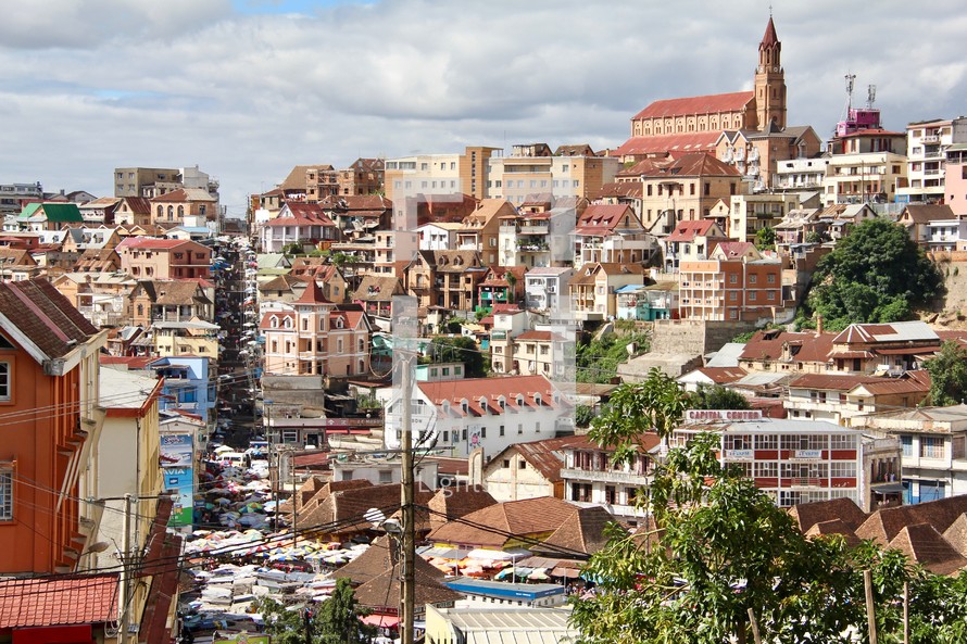 Antananarivo, Madagascar, roof tops of homes and the cathedral on the hill