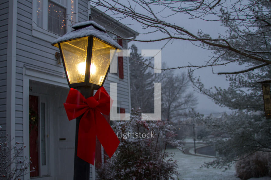 street lamp with a red bow 