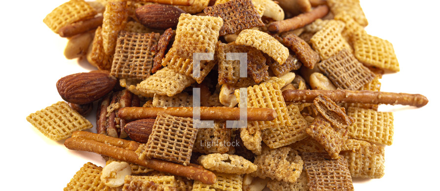 Chex mix on a white background