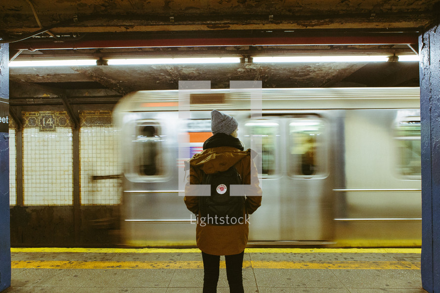 woman waiting in a subway 