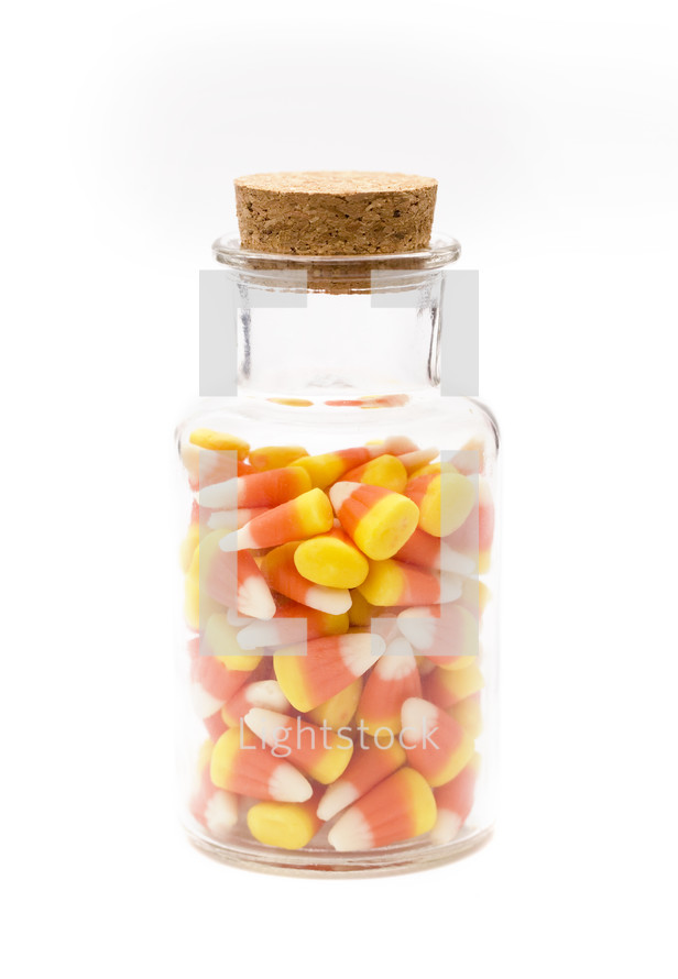 candy corn in glass jar 