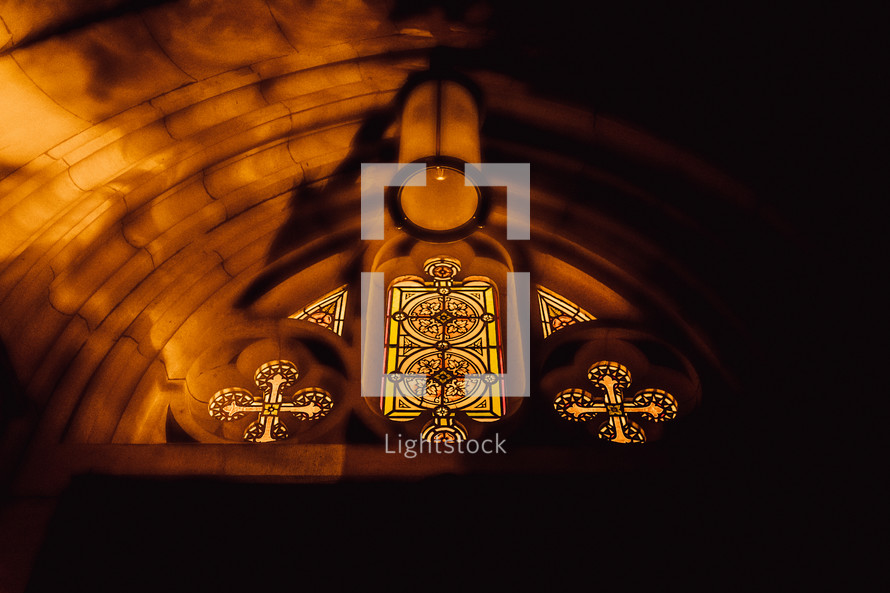 glowing light on a church at night 