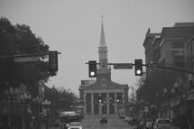 view of a church looking down a city street 