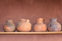 clay pottery on a shelf 