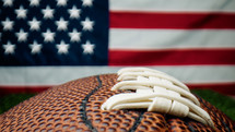 American flag with view of football